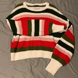 White green pink red striped sweater
